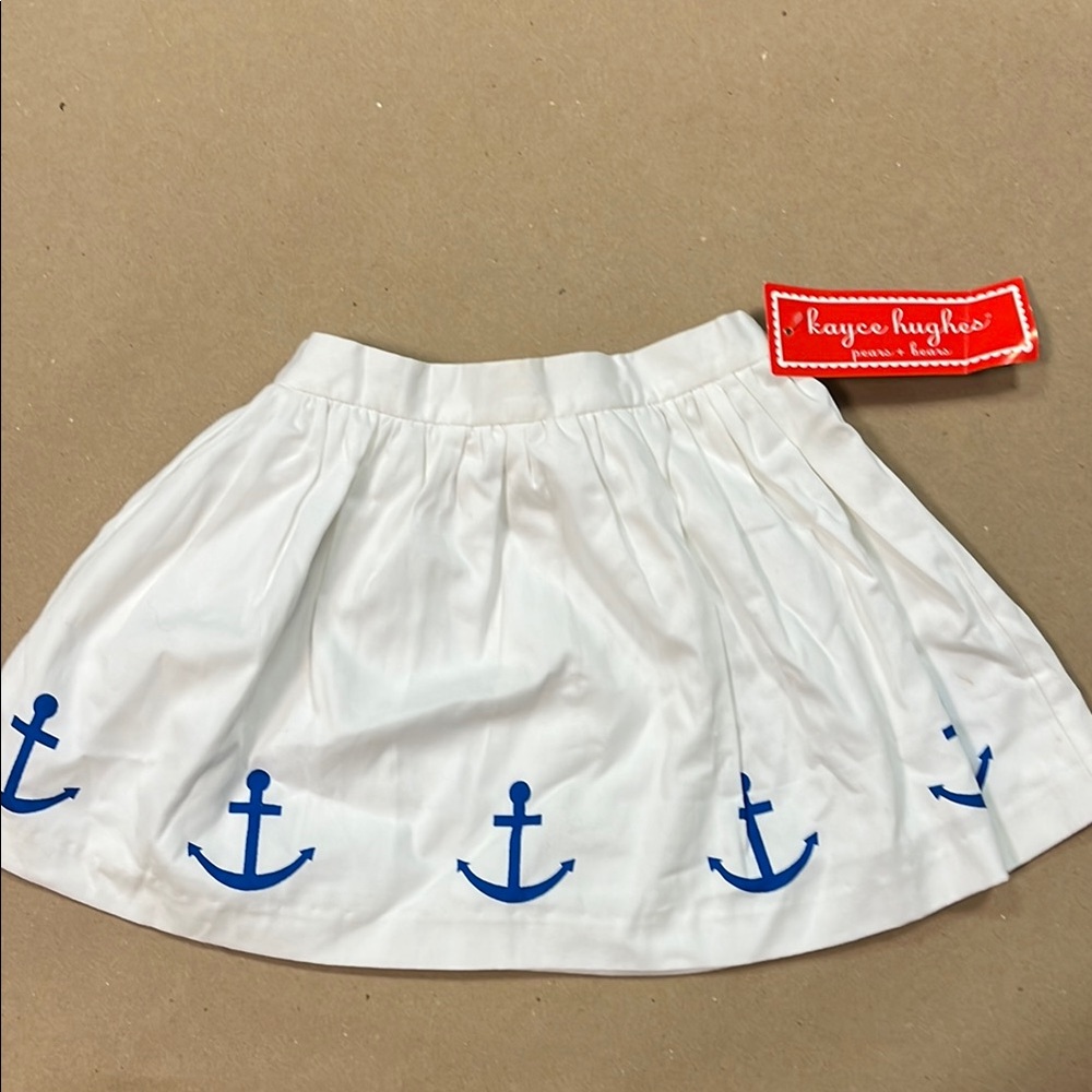 Super cute white skirt with blue anchor print on front